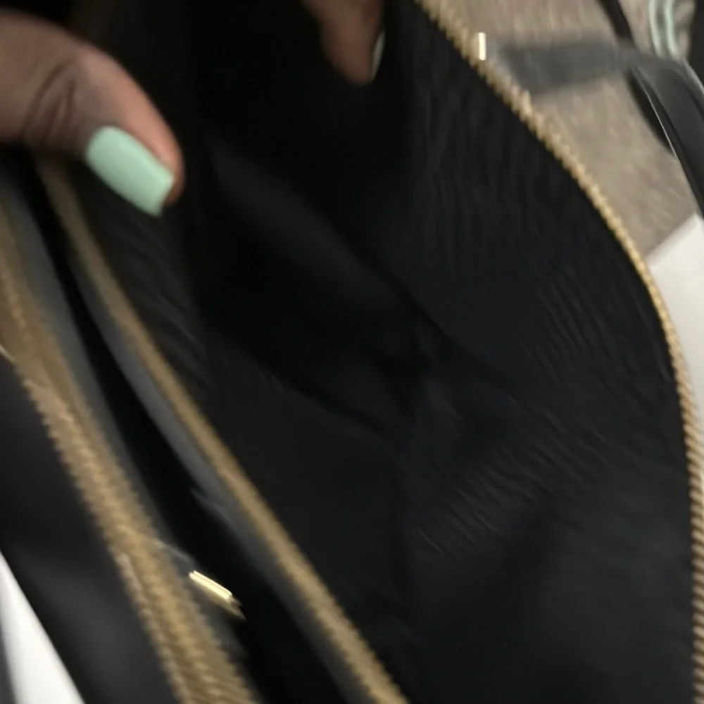 Kate Spade Black and Gold Shoulder Bag with Structured Design